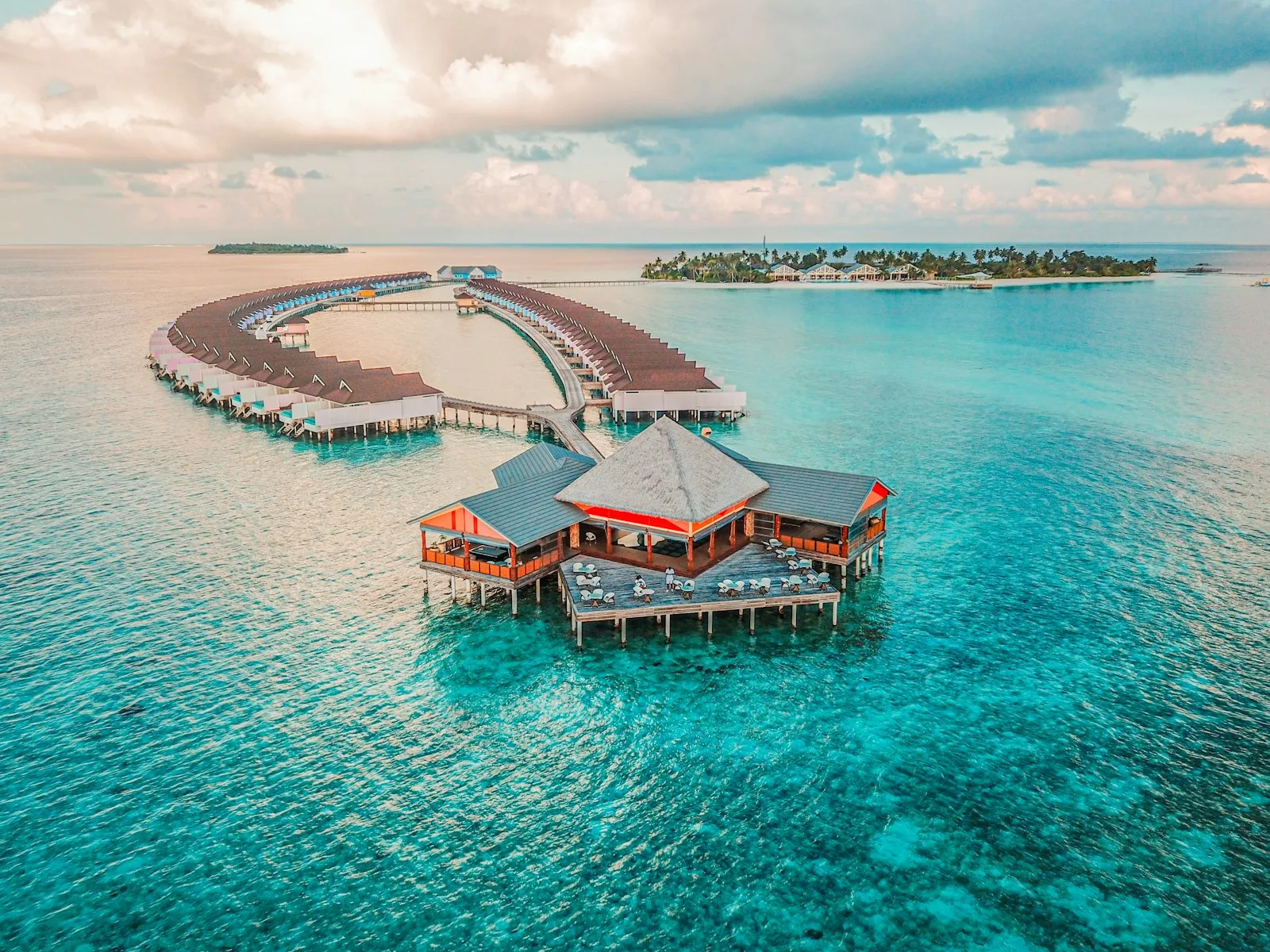 Overwater villas in the Maldives at sunset